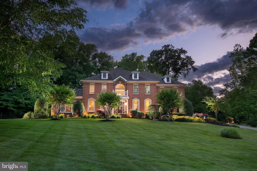 SOUTH RIVER COLONY CONSERVATORY ESTATES  SIDE - YOUR PRIVATE OASIS ON THE GOLF COURSE 
This exceptional estate, nestled on a private 2.20-acre lot in the highly sought-after South River Colony, offers a luxurious and sophisticated living experience. A true compound on the golf course and just minutes away from Annapolis, this exclusive community boasts a golf course, a community restaurant, swimming pool, tennis, picnic areas and more,  providing residents with a wide range of recreational activities.

As you step into this stunning home, you are immediately captivated by its meticulous updates and stylish design. The spacious layout and thoughtful floor plan invite relaxation and entertainment for all. With five bedrooms, including four en suite, there is ample space for family and guests. The true gourmet kitchen is a chef's dream, equipped with top-of-the-line appliances including thermador oven , 2 walk ovens, ice machine, and two walk-in pantries, ensuring that every culinary need is met.

The basement of this remarkable estate is a haven for entertainment. Over 2800 sqft of fun, It features a built-in mahogany bar with a two-tap glycol beer system, beverage fridges, and ice maker,  and bar seating for 10-12 people, perfect for hosting gatherings and parties. The sprawling entertainment room is equipped with a stage and lights, catering to the entertainers in the group.  Whether it's a live performance or a karaoke night, this space is designed to impress. All of this with easy walk-out stair to the outside amenities of the home.

The outdoor amenities of this property are equally impressive. Step outside to discover a remarkable saltwater pool with a diving board and gracefully cascading waterfalls, surrounded by seasonal blooming flowers. The pool house features a built-in gas-fired wood fireplace, creating a cozy ambiance for relaxation. Adjacent to the pool house, an outdoor shower and 1/2 bath provides a refreshing experience after a swim. or after relaxing in the  spa. 
The meticulously landscaped and hardscape grounds also include a lighted sports court, perfect for a game of basketball or soccer. The outdoor kitchen, complete with running water and a granite countertop, beverage fridge, grill, all allows for outdoor cooking and dining. 

Practical features abound in this estate, ensuring convenience and comfort. The home is equipped with a new HVAC system, boasting a 20 SEER rating for energy efficiency. A water treatment system, over sized water heater, washer/dryer, and laundry room built-ins are also included. The oversized three-car garage with epoxy floors provides ample space for vehicles, toys, and tools. Additionally, a built-in  generator, system, and irrigation system add to the practicality of this home.

The  audio system plays both inside and outside the house, providing a seamless audio experience throughout the property. These properties are rare to the market in the South River Colony Estates, making it a truly unique opportunity for discerning buyers.

Every part of this  property has been carefully designed, built, and manicured to create the ultimate oasis. 

This home has been lovingly cared for, with every detail carefully considered to invite, relax, and welcome. From the grand foyer entrance with its curved staircase that opens to the great room, to the fabulous master suite with a dual-sided gas fireplace and spa-like bath, this estate exudes elegance and luxury.

In conclusion, this exceptional estate in South River Colony offers a truly premium living experience. With its stunning design, meticulous updates, and an array of luxurious amenities, this home is the epitome of refined living. Whether you are looking to relax by the pool, entertain in style, or simply enjoy the tranquility of the private surroundings, this estate fulfills every aspect of premium living.