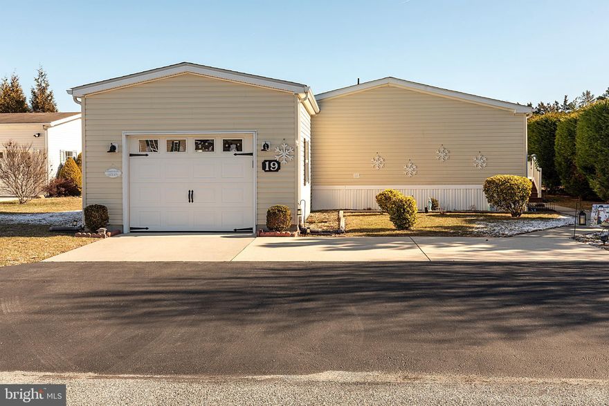 Welcome home to this beautifully maintained, move-in-ready gem where you won’t need to change a thing! Enjoy bright, spacious living throughout! The home features a primary bathroom with a convenient connection to the laundry room, making everyday living effortless. Located just minutes from the beaches, this home offers the perfect blend of comfort and coastal lifestyle. Within a community rich with amenities, you’ll have access to a vibrant clubhouse with weekly activities, an indoor saltwater swimming pool, dog park, bocce ball court, and easy access to the Lewes–Georgetown Walking Trail. Residents also receive a yearly pass to enjoy the outdoor pool at Colonial East! Recent upgrades include a brand new washer and dryer installed 1/17/26, new carpet throughout, as well as new front door and door frame installed in 2023. This is easy living at its finest — just unpack and start enjoying everything this community has to offer!