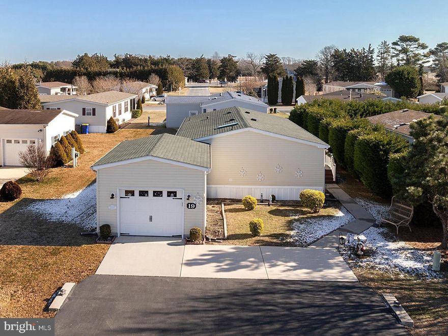 Welcome home to this beautifully maintained, move-in-ready gem where you won’t need to change a thing! Enjoy bright, spacious living throughout! The home features a primary bathroom with a convenient connection to the laundry room, making everyday living effortless. Located just minutes from the beaches, this home offers the perfect blend of comfort and coastal lifestyle. Within a community rich with amenities, you’ll have access to a vibrant clubhouse with weekly activities, an indoor saltwater swimming pool, dog park, bocce ball court, and easy access to the Lewes–Georgetown Walking Trail. Residents also receive a yearly pass to enjoy the outdoor pool at Colonial East! Recent upgrades include a brand new washer and dryer installed 1/17/26, new carpet throughout, as well as new front door and door frame installed in 2023. This is easy living at its finest — just unpack and start enjoying everything this community has to offer!