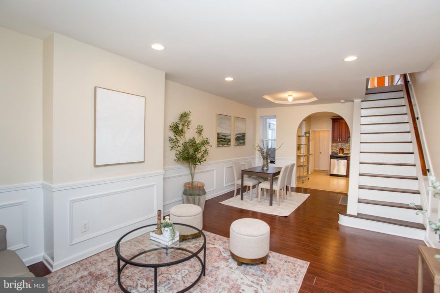 Welcome to 5230   Hazel Avenue, located in the Cobbs Creek neighborhood, adjacent to Cedar Park and just minutes away from University City. This beautiful row home features three bedrooms and one and a half bathrooms, offering comfortable and convenient living. As you enter, you'll find a welcoming living room with beautiful wooden floors and a cozy atmosphere. The open-concept living and dining areas seamlessly connect to the kitchen, which is equipped with stainless steel appliances .
Recessed lighting enhances the space, creating a bright and inviting environment. On the main floor, there is also a convenient half bathroom and access to the backyard through a rear exit door. Upstairs, you'll discover three generously sized bedrooms and a full bathroom, providing ample space for family or guests. The finished basement features a laundry area, a central air unit, and an additional room that can serve as a home office, gym, or extra storage. This home boasts a small backyard perfect for relaxing outdoors, as well as a front porch to enjoy neighborhood views. Move-in ready and well-maintained, this property is waiting for its new owner. This home has distinctive features that wil wow you and upgrades to delight you with an upgraded kitchen, newly painted first floor and a fabulous, finished basement. Easy access to University City, restaurants as well as major thoroughfare's. Welcome to the neighborhood!