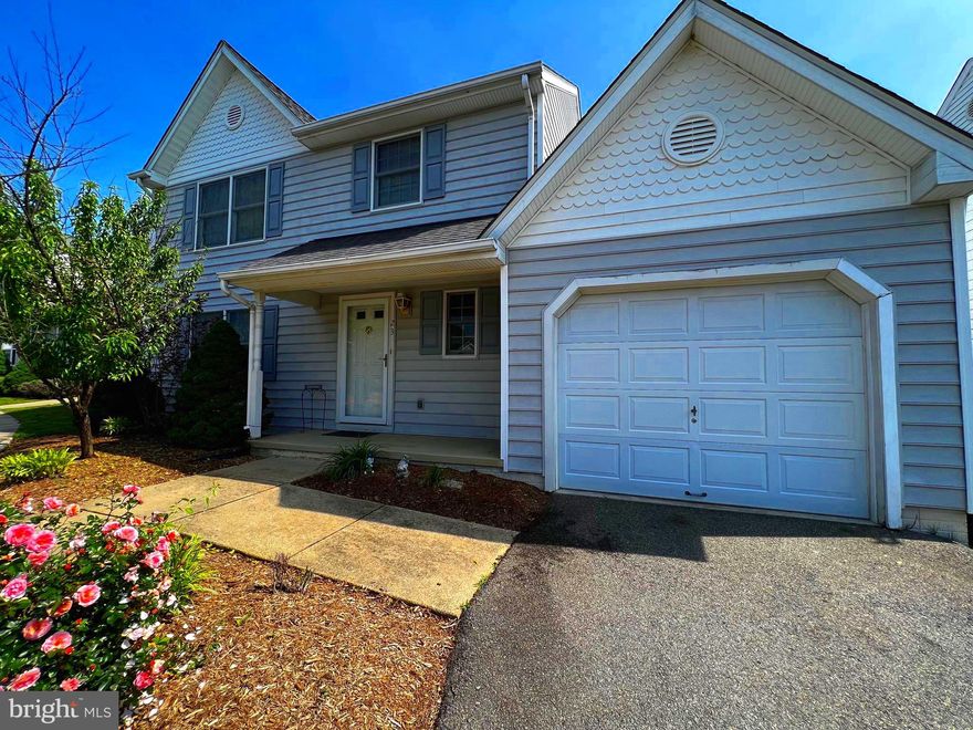 Prime location! You are within walking distance to stores, restaurants, commuter bus lot, boutiques and more. This lovely 2 story home features 3 bedrooms ALL with their own private ensuite bathrooms. The Main floor bedroom offers a cozy fireplace and access to the secluded back deck. The other two rooms are located upstairs and are extremely spacious, have tons of closet storage, and private bathrooms. The full laundry room (not a closet or cubby) is also located upstairs and the washer and dryer convey to the new owners. Back down on the main floor you will find a timeless lay out allowing for easy entertaining. The living room, kitchen, and dining room and all in eye shot making entertaining for the holiday's a breeze. Just off the dining room is door leading to the privacy fenced yard with massive deck. There is plenty of room for a full sized table and chairs, a grill, and a bistro set. So take the entertaining and living to the outdoors NO PROBLEM! All yard maintenance is covered by the HOA so no need to spend free time on the weekends maintaining the yard. Just enjoy life a little. You have parking in the garage, the driveway, and an assigned spot in the open parking area! Once you own the home, new flooring and fresh paint will really make this home perfection!