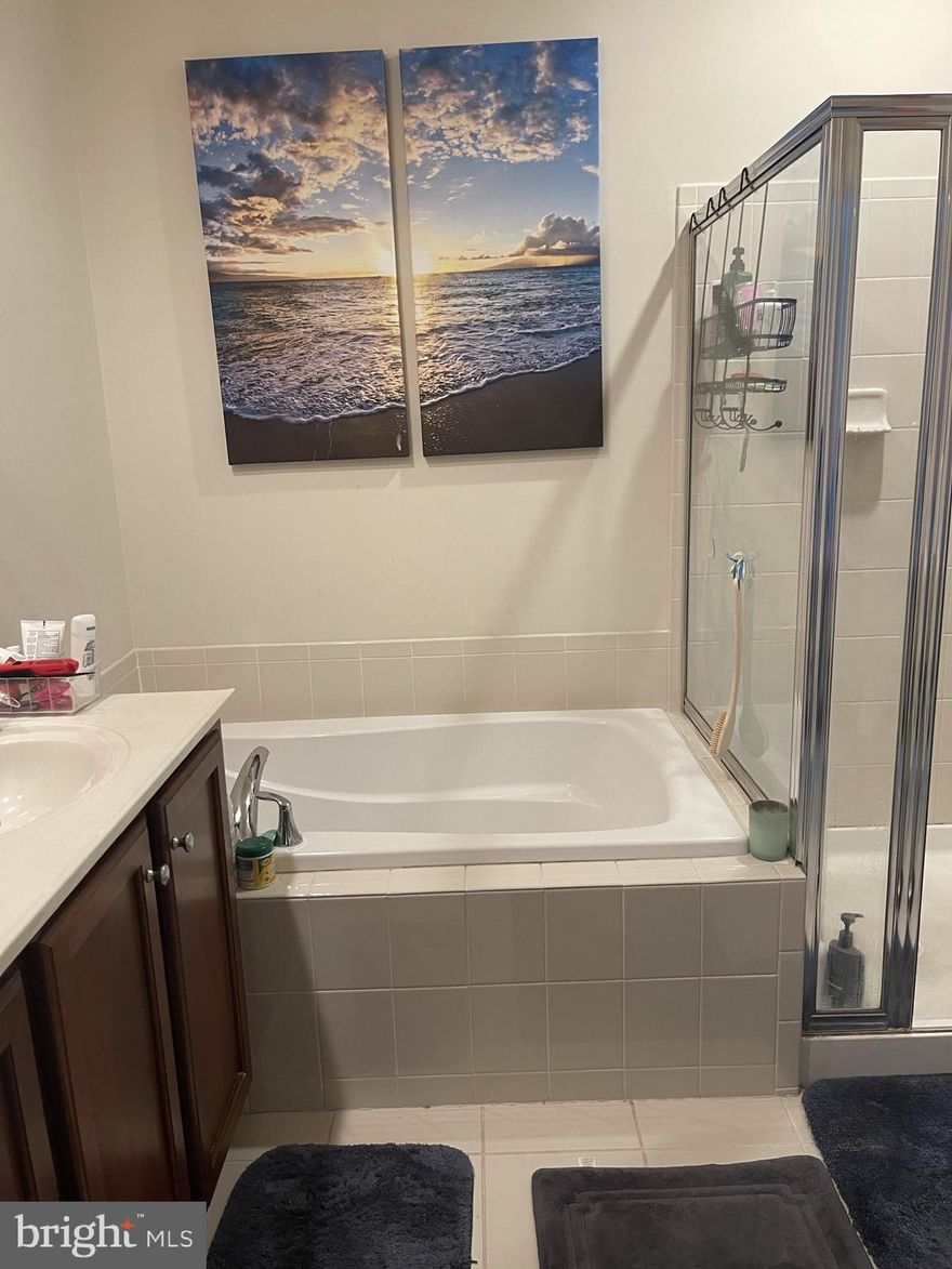 Well maintained 2 level Condo. The largest model available in this sought after community.  This is a move in ready home with upgraded kitchen appliances, granite countertops, lots of natural lighting, modern floor plan and endless options.
Enjoy this beautiful home that features an open floor plan, on the main level with gorgeous hardwood floors, a large kitchen with upgraded stainless steel appliances, large center island with plenty of counter space for food prep and breakfast bar area.  Primary bedroom suite features large walk in closets and private en-suite bath.  Two additional spacious bedrooms and a full bathroom and two walkout balconies, laundry room on the main living area beautiful window shutters and much more.