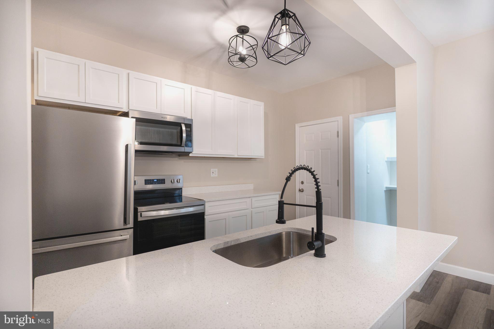 Beautifully Renovated 3 Bed / 1.5 Bath End-of-Row Townhome Just Minutes from Downtown Baltimore!
This stunning home features a modern open-concept layout with a spacious living and dining area—perfect for entertaining. Enjoy brand-new flooring and carpet throughout, a gourmet kitchen with stainless steel appliances, and fully updated systems including HVAC, water heater, plumbing, electric, and insulated windows. The private fenced backyard adds the perfect touch for outdoor relaxation. Conveniently located near popular restaurants, shops, and outdoor attractions, this home combines comfort, style, and accessibility.