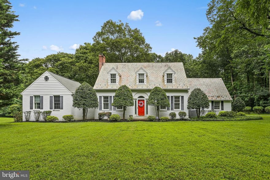 Welcome to 1017 W Padonia Road — a charming Cape Cod nestled in the heart of Cockeysville. Set on a large peaceful lot with mature trees and a circular driveway, this 4-bedroom, 3.5-bath home offers over 2,600+ square feet of flexible living space and timeless character. Inside, you'll find a thoughtfully updated kitchen featuring a large island with seating, stainless steel appliances, tile backsplash, recessed lighting, wood beams on the ceiling, and durable LVP flooring. Just off the kitchen is a formal dining room with wood flooring, a cozy den with wood floors, and a spacious living room with a wood-burning fireplace, built-in cabinets, and more of those beautiful wood beams. The main level addition includes a tile-floored laundry room and a serene primary suite with crown molding, chair rail, a large walk-in closet, and a spa-like bath complete with a soaking tub, double vanity, and walk-in shower. Upstairs, you’ll find two additional bedrooms, a hall bathroom, along with the former primary bedroom, which features its own bath with a walk-in shower. In need of storage, a workshop, or garage space? The 3-car detached shed includes a loft area and electric (buyer to verify connection). The house also includes a whole-house generator, a 1,000-gallon owned oil tank, slate and shingle roofing, an exterior Trex deck, and loads of character throughout. Sold as-is, this is an estate sale offering tremendous potential in an unbeatable location.