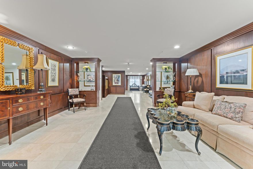 This charming mid-rise condo, built in 2005, offers a perfect blend of comfort and modern living. Step inside to discover a spacious family room that flows seamlessly into a well-appointed kitchen featuring a stylish island and stainless steel appliances, including a wall oven. The warm wood floors create an inviting atmosphere throughout the home. With two generous bedrooms, including a walk-in closet, there's ample space for relaxation and storage. Enjoy cozy evenings by the fireplace or step out onto your private balcony for fresh air and views. Convenience is key with in-unit laundry. Secure entrance with intercom access. The community enhances your lifestyle with amenities like common grounds, an assigned parking spot in a covered garage, a gated entrance along with a secured buidling to ensuring a worry-free living experience. Located in walking distant to several restaurants and just minutes from commuter rail, metro stations, several shopping centers, markets and restaurants. This home is perfect for those seeking both comfort and accessibility. Embrace the opportunity to make this spacious and delightful space your own!