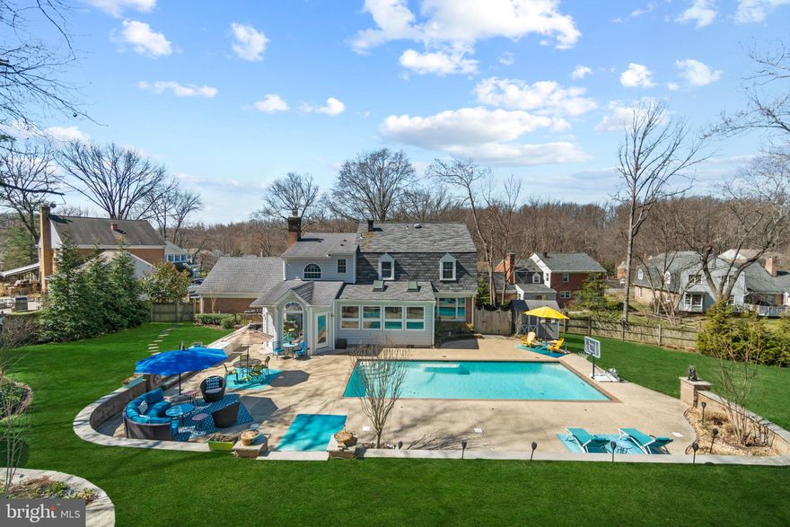 OFFER DEADLINE- Tuesday, March 22nd at 5  PM. Your summer oasis awaits! Dreaming of warmer weather to relax poolside or how about more space to entertain for those summer parties/bbq's? Then look no further and call this home. This 4 BR/3FB/2HB colonial perched on a 1/2 acre and walking distance to Potomac Village, is the quintessential summer retreat but in the comfort of your own home. The outside shouts 'Honey stop the car!' from the long driveway to the fully fenced rear yard that features a saltwater pool, multiple seating areas, TONS of yard space, extensive and impressive hardscape, a grilling area and shed to house pool accessories and gardening equipment. Inside is just as impressive as the exterior. The main level boasts an office, oversized dining room, sitting room off kitchen with bar, a spacious and updated kitchen, a breakfast room with pool views and skylights, a sun room off the breakfast room with access to the backyard, a living room with a wood burning fireplace, laundry/mud room and half bath. Moving upstairs, the primary bedroom is setback which enhance your retreat experience. Primary bedroom features hardwood floors, a spacious primary bathroom and what use to be the 5th bedroom was converted into a large closet (someone could convert this back if desired). Finishing the upstairs are 3 bedrooms and 2 full bathrooms.  Still looking for more space? How about a recreation room with a wet bar, movie theater area (movie theater equipment & sets convey with sale of property), space for your workout equipment, another half bath and ample storage space.