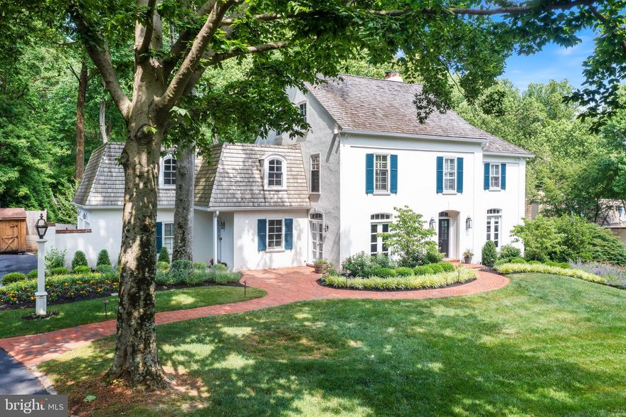 This is the home you’ve been waiting for! Nestled on one of the largest lots and a cul de sac street in the coveted neighborhood of “The Woods”, this updated and expanded French Colonial offers 6 bedrooms and 4.5 baths, plus an array of amenities for the best in Main Line Living.

The elegant exterior seamlessly connects with the beautiful indoor spaces, creating  the perfect blend of comfort and tranquility. Upon arrival, you are welcomed to the property by the winding brick walkway to a custom wooden front door with double-pane windows. Upon entering the home you’ll immediately feel the warmness of the hardwood floors, which flow throughout the entire first floor, tasteful crown molding, an abundance of natural light, and two convenient coat closets. Directly off the foyer sits the formal dining room adorned with imposing floor-to-ceiling windows overlooking the front yard, crown molding, wainscoting, chair rail, and a glass French door that provides access to a warm outdoor seating area. Across the foyer is the family room with a striking floor-to-ceiling window, an oversized picture window offering views of the rear yard, and a marble surround wood burning fireplace flanked by two custom wooden built-ins. A bright and airy breakfast room sits snug in the rear of the home, decorated with a brick surround gas fireplace, a custom walnut-topped built-in desk, a quaint eating area with a picturesque view of the rear yard, built-in shelving, and a vaulted ceiling. Prepared to be wowed by the recently expanded gourmet chef’s kitchen equipped with polished soapstone countertops, a substantial walnut-topped center island with a prep sink and microwave built-in, a La Cornue range with a handcrafted walnut Zephyr hood, a Wolf wall oven, Aston Black recessed door white cabinets, two miele dishwashers, white washed brick backsplash, a walk-in pantry, a butler’s pantry/coffee bar, and french doors that lead to the expansive brick and flagstone patio. A sizable mudroom sits right off the kitchen, with cherry cubbies, built-in storage, granite-topped work center, stone flooring, and opportune access to the attached two-car garage.

Take the front-turned wooden staircase to the second floor and make your way to the primary suite detailed with a large picture window overlooking the rear yard, two walk-in closets, and an intimate reading nook with custom built-in bookshelves. The exclusive ensuite bath features a marble-topped double vanity, a seamless glass shower, and a linen closet. Three additional bedrooms can be found on this floor, each with hardwood floors and ample closet space. Two bedrooms share the use of a full hall bathroom, with the third bedroom enjoying a private ensuite bathroom. Rounding out the second floor is a laundry room with herringbone flooring, a sink, and storage. The sizable third level of this home hosts the final two spacious bedrooms, with their own allocated full-hall bathroom. 

The daylight walk-out basement is equipped with an entertaining area, plenty of space to accommodate a fitness studio, and an abundance of storage. Last but certainly not least, exit the home through the glass French doors in the kitchen to the private rear property which is an oasis for gatherings, ideally set up with a custom brick and flagstone patio, an in-ground swimming pool with a flagstone deck and retractable cover, and multiple sitting areas to soak up the summer sun.

The “Woods” is an exceptional neighborhood with block parties, progressive dinners, and two cul de sacs where children can ride their bikes. This premier location provides easy access to the Village of Wayne and its upscale shops and restaurants, and the Radnor and Wayne train stations. Award-winning Radnor Schools!!

Showings begin Friday June 16th at the Open House 1-3PM