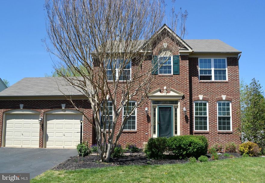 BEAUTIFULLY maintained bright and airy brick front colonial.  New granite countertops, new HVAC last summer, central vac, glass pocket doors throughout, motorized cabinetry, wainscotting, crown molding, tray ceilings,custom built-ins, 2 FP, Jacuzzi tubs, Bose speaker system, MBR custom closet, irrigation system & more!  HUGE fenced yard with stone patio backs to common area.  This is a must see!