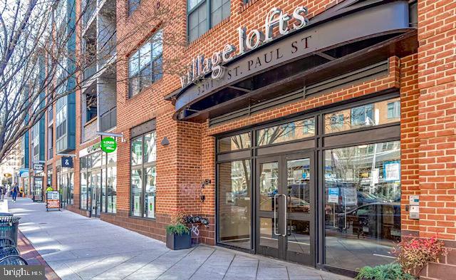 Spacious 2 bed, 2 bath condo located just steps from Johns Hopkins University (2 blocks to be exact) and close to several other colleges and hospitals. This light-filled unit features hardwood floors, large windows, and an open layout. Both bedrooms are generously sized with ample closet space and ensuite baths . Enjoy the convenience of assigned garage parking, secure building access, a mail/package room, and elevator service. Prime location in Charles Village with easy access to dining, shops, and public transportation. Great opportunity for investors or owner-occupants alike. Could rent for $3,500 a month. Deeded Parking space is P2 space #22, Storage #55. Pet policy is 1 Dog, OR 2 cats, OR 1 dog and 1 cat, OR 2 Dogs, OR 3 caged birds collectively not more than 60 lbs total.