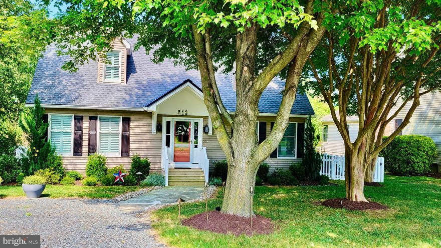 Coming Soon! Welcome to 312 Irene Way, Kent Island, Maryland

Get ready to fall in love with this sunny Kent Island coastal cape cottage, perfectly situated on a spacious corner lot with stunning water views. Boasting over 3,400 sq. ft. of living space, this vibrant home features 4 bedrooms and 3 full baths in the highly desirable Bay City community.

Step inside to discover a redesigned chef's kitchen, complete with a large island, upgraded appliances, beautiful cabinets, and a propane cooktop with a pot filler. The open floor plan includes hardwood floors, recessed lighting, and plantation shutters throughout. The expansive great room is perfect for entertaining family and friends, featuring a cozy driftwood log fireplace and a stylish wall unit that completes this stunning home.

The first-floor bedroom is conveniently located near a lovely full bath, while the second upstairs bedroom offers two ample closets. The third upstairs bedroom provides additional storage with a closet and extra space. The luxurious owner's suite is a private haven, boasting three walk-in closets, a spa-like bath with a heated floor, a separate shower, and a soaking tub. Enjoy serene water views from the lower-level deck.

Step outside and take advantage of this breathtaking property featuring a new roof (2021), a beautifully landscaped yard, two separate driveways for guests and water toys, and a two-car garage with a large workspace, full freezer, and party fridge. Sit back and enjoy the sunset on the deck overlooking the marsh. Additional conveniences include a reverse osmosis watering system in the kitchen, a tankless water heater, an AC heat pump, a dehumidifier, and an encapsulated crawlspace and attic.

Located just 15 minutes from downtown historic Annapolis, this home is close to excellent schools, parks, tennis courts, restaurants, and grocery stores. The low HOA fee includes access to a pavilion, kayak launch, and children's play area. Don't miss out on this incredible opportunity to own a piece of paradise on Kent Island!