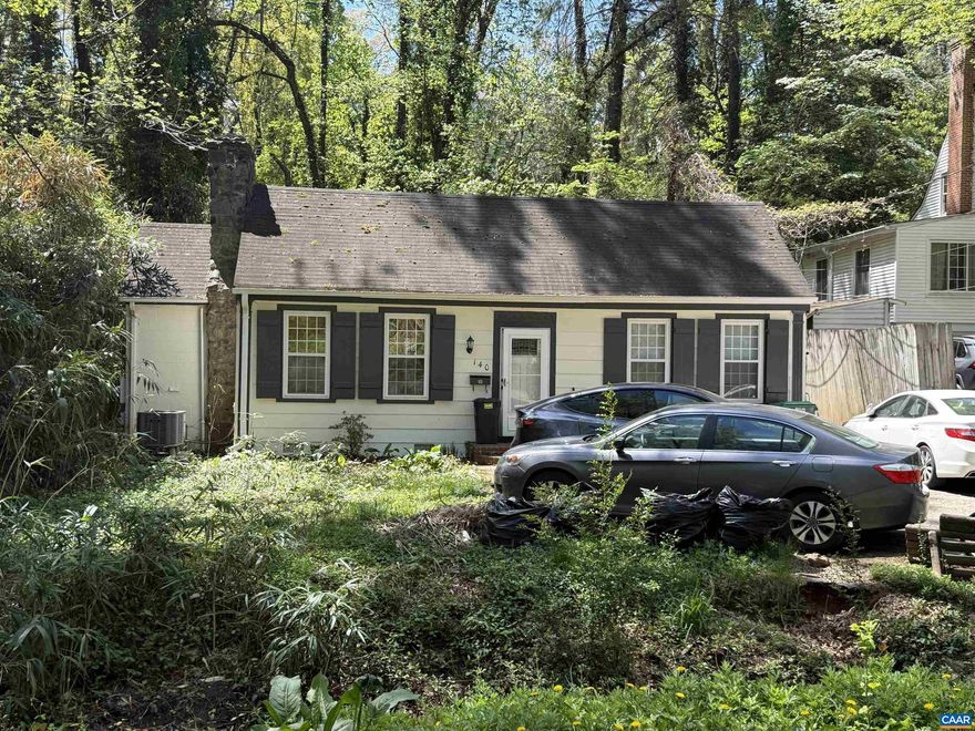 Wonderful opportunity to live near the Grounds of UVA. This charming cottage affords one level living and has built-in bookshelves and a pitched ceiling in the living room. The home is currently rented through May of 2026. Walk to UVA and UVA hospital.,Formica Counter,Wood Cabinets,Fireplace in Living Room