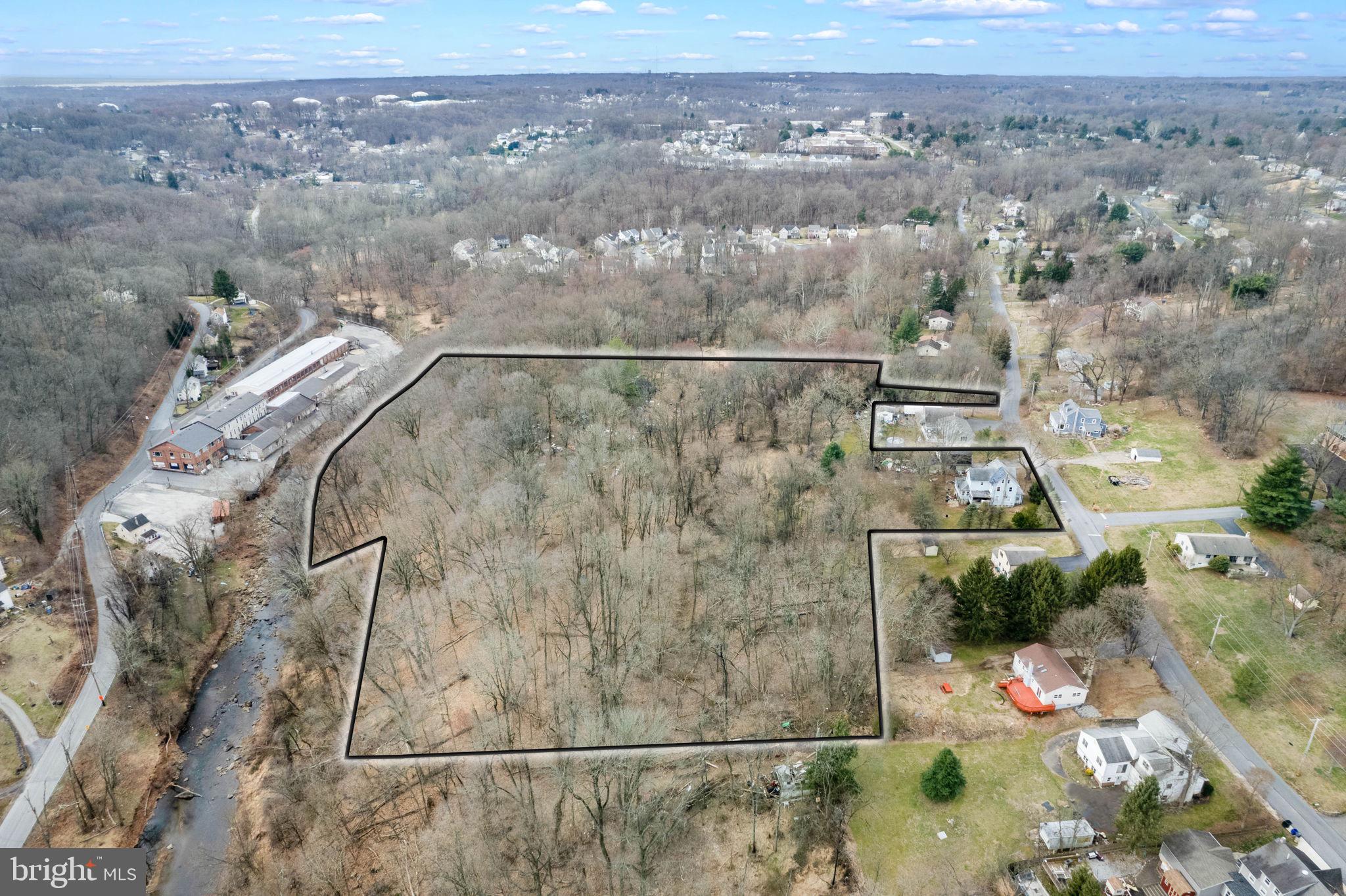 Rare opportunity to own 10.96 acres situated on two separate parcels in the heart of Aston. This private, partially wooded parcel spans from 324 to 332 Crozerville Road. This exceptional property offers several possibilities to include the development of one or two properties or the potential of subdivision offering commanding homesites. Two current points of entry off of Crozerville Road provide access to the gently sloping terrain backing to the West Branch Chester Creek and siding approximately 13 acres of dedicated open space. The property includes several buildings in need of updating being conveyed in as-is condition. The best use for this property is in the eye of the beholder. It's and ideal location for a fabulous residence or a natural division for 2 separate parcels. Alternatively, the property offers a rare opportunity for development of multiple homesites. Include parcels 02000074402 and 02000074300