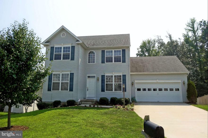 Available quickly! Cheery KT w/hickory cabinets, gas stove, microwave, brkfst area. Chair rail & crown molding in DR. Family rm plus living room/office. Good-sized MBR, bath w/soak tub & sep shower. Finished bsmt w/rec room plus 4th BR, 3rd full bath. Plantation blinds, washer & dryer provided. Huge deck, 2-car garage, yard backs to trees. Pets case-by-case, no smokers. Easy commute to NAS PAX!