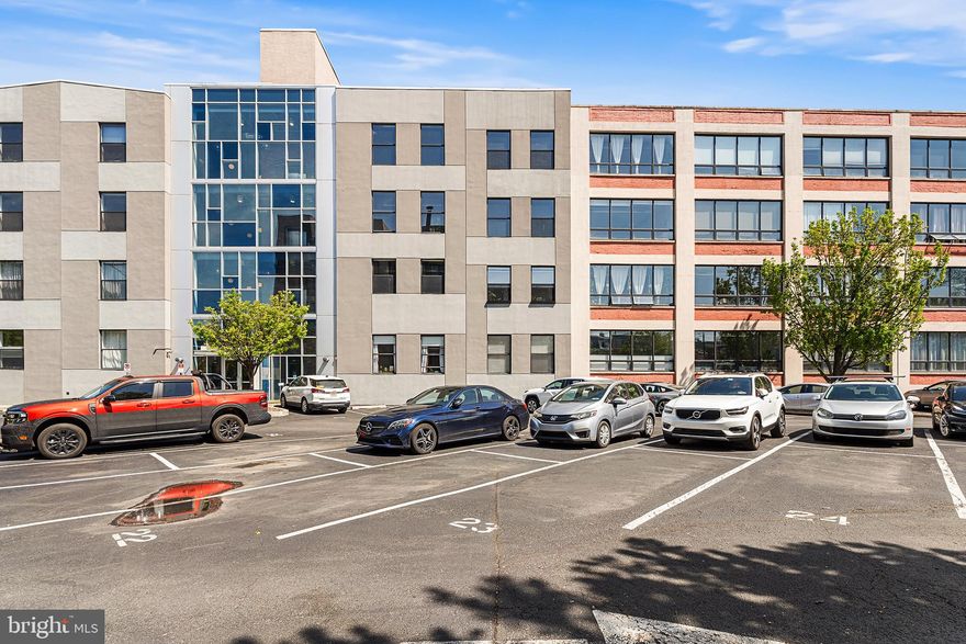 Welcome to your dreamy loft apartment in the highly sought-after Memphis Flats in Fishtown. This unique building offers true loft-style living with an assigned parking space, fitness center, and basement storage—all in the heart of one of Philadelphia’s most vibrant neighborhoods. Unit 204 has been lovingly maintained by its original owner since the building’s conversion from a historic factory into stylish living spaces. It presents a rare opportunity to own in one of Fishtown’s most distinctive buildings. One of only a limited number of units featuring a private balcony and an additional coat closet at the entry, this home stands out from the rest and offers features not commonly found in the building. Step inside and immediately feel the character—exposed brick walls, wood ceilings with beams, and concrete floors create the perfect balance of industrial charm and modern comfort. The open living and kitchen space is ideal for entertaining, filled with natural light from oversized windows—perfect for plant lovers. The kitchen features stainless steel appliances, recessed lighting, a pantry, and ample cabinet space. Just off the kitchen, enjoy your private balcony—perfect for morning coffee or unwinding after a long day. The bathroom has been upgraded with a walk-in shower, and the unit also includes in-unit laundry with additional storage plus the bonus coat closet. Both bedrooms offer great natural light, their own closets, and comfortable layouts for everyday living. Located just steps from some of Fishtown’s most popular destinations, including La Colombe, Kalaya, Loco Pez, Meetinghouse, and Elma, along with nearby fitness options like City Fitness, Monarch Yoga, and Spoke Society. Easy access to I-95 and SEPTA makes commuting simple while keeping you close to everything the neighborhood has to offer. A unique opportunity to own a character-filled loft with rare features, parking, and unbeatable walkability in one of Philadelphia’s most in-demand neighborhoods.
