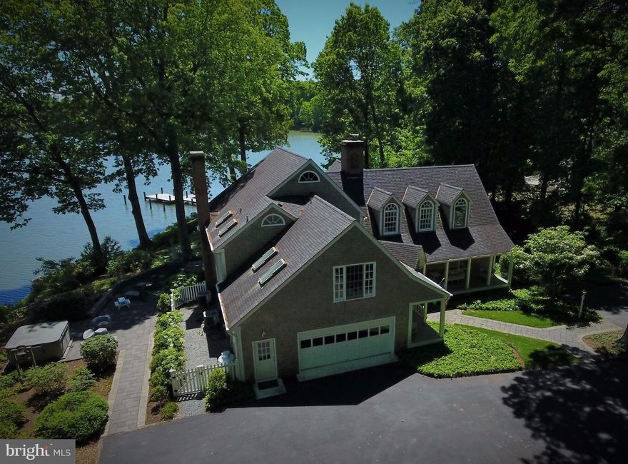 Magnificent custom Post & Beam WATERFRONT beauty on 3 beautiful, tranquil acres. PANORAMIC waterfront. Private Pier. 2 car garage& parking aplenty.Tastefully updated kitchen & baths. Hardwoods. Stunning windows/views. Privacy! Main level bedroom/full bath. Master suite w/water views,walk-thru closet, spa bath & loft. ALL bedrooms are ensuite. Finished basement. WATCH floorplan Tour w/Drone video!