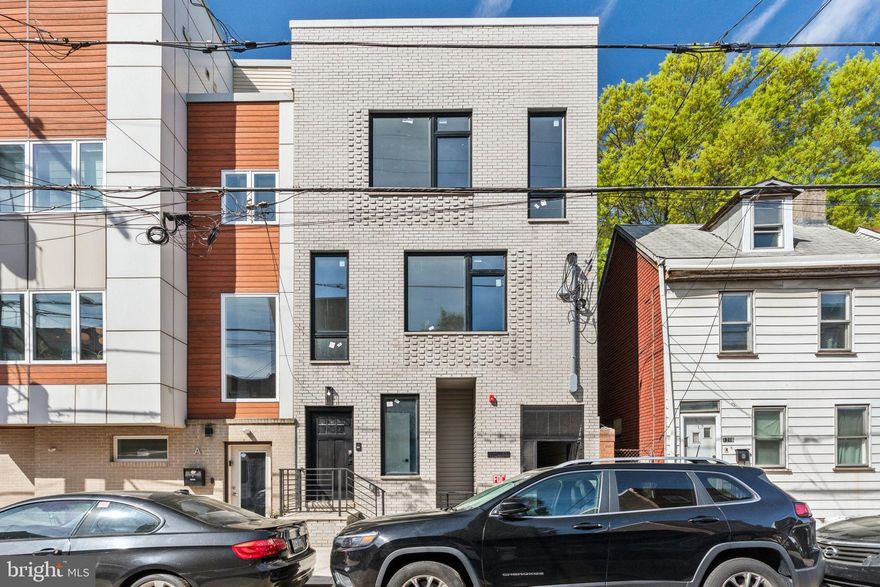 Offering 4.75% (Temporary 1 year interest rate) 2% interest rate buydown for the 1st year at ZERO cost to the buyer when using the seller/builder’s preferred lender. Experience modern elegance in this luxury bi-level condo with a Roof Deck located at 1214 E Susquehanna Ave, Unit D, in the vibrant Fishtown neighborhood of Philadelphia. This new construction offers a full 10-year tax abatement and a 1-year builder warranty. The first floor features a spacious bedroom, a state-of-the-art kitchen with wood grain cabinets and high-end finishes, and a living room adorned with large windows that flood the space with natural light. The upper level boasts two additional bedrooms, two well-appointed bathrooms, and a convenient laundry room. The property sits on an expansive lot, providing ample outdoor space for relaxation or entertainment. Situated in Fishtown, one of Philadelphia's most sought-after neighborhoods, residents will enjoy proximity to a plethora of local hotspots. Culinary delights await at acclaimed eateries such as Suraya, a Lebanese market and restaurant, and Wm. Mulherin's Sons, offering Italian-inspired cuisine in a stylish setting. For craft beer enthusiasts, the nearby Yards Brewing Company provides a spacious taproom with a variety of brews. Music lovers can catch live performances at the iconic Johnny Brenda's, while outdoor enthusiasts can explore the scenic trails along the Delaware River or relax at Penn Treaty Park. Commuting is a breeze with easy access to SEPTA's Market-Frankford Line at Girard Station, connecting residents to Center City and beyond. Don't miss the opportunity to own a luxurious condo in one of Philadelphia's most dynamic neighborhoods!