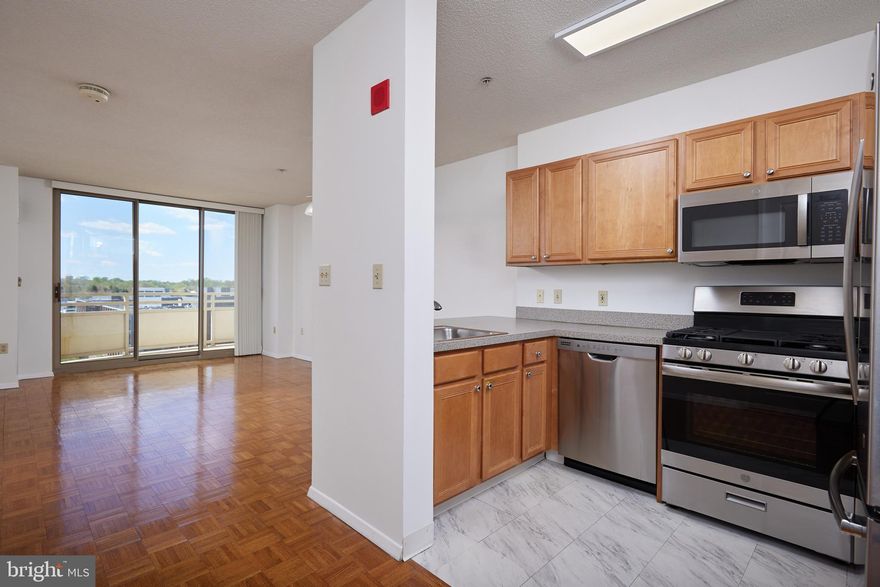 Welcome to the penthouse, unit 903 in Crescent Plaza. The hardwood floors and large windows create a bright and inviting atmosphere with panoramic views of Downtown Bethesda from the private outdoor space. 
The open-concept kitchen with stainless steel appliances and granite countertops is perfect for both everyday cooking and entertaining guests. 

The large primary bedroom with a walk-in closet offers ample storage space, and having a full bath with an in-unit washer and dryer adds convenience. 
This unit come with an assigned garage parking space,  a valuable bonus in a bustling area like Bethesda. No Pets. Call Brendon Mills (301) 793-6411 with any questions. Rentspree application.