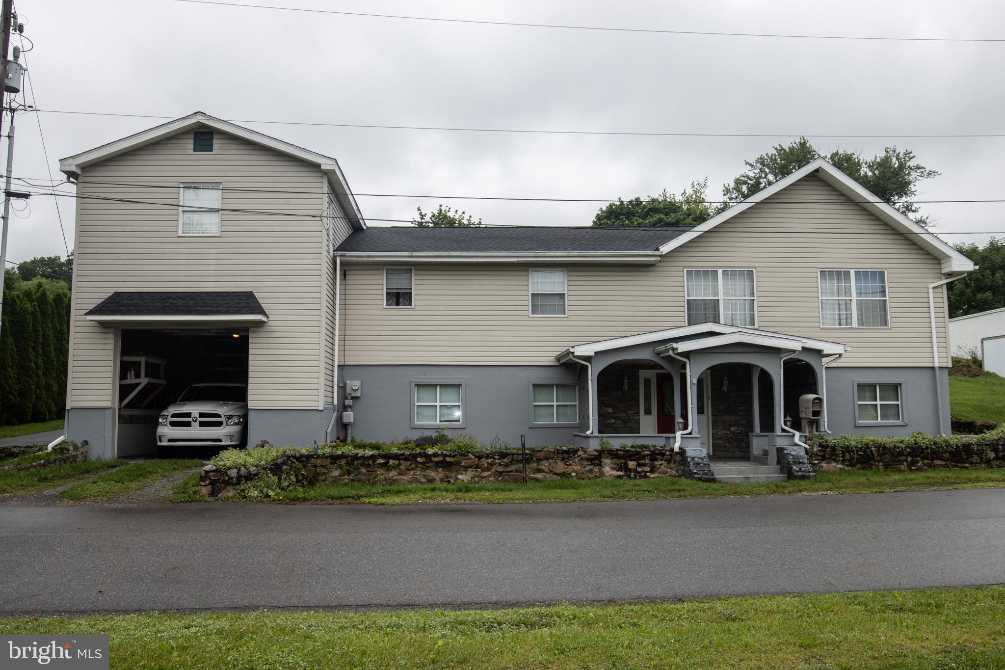 If you’re in search of a large, versatile home in the Williams Valley School District, look no further! This spacious property offers 3 bedrooms plus an office that could easily serve as a 4th bedroom, providing plenty of room for your family, hobbies, or guests. The living room features vaulted ceilings with beautiful exposed beams, a cozy propane fireplace and stone inlaid in the wall for decor. Enjoy the flow of indoor-outdoor living with a separate dining area and a deck just off the kitchen, ideal for entertaining. Just off the deck you will find a hot tub that is a welcome retreat during colder months, adding a touch of luxury to your everyday life. Downstairs, there's the potential for a 5th bedroom along with a family room, half bath, and access to an oversized garage that has a ton of space! This home truly combines comfort, space, and functionality. Don’t miss your chance—call today to schedule your private showing!