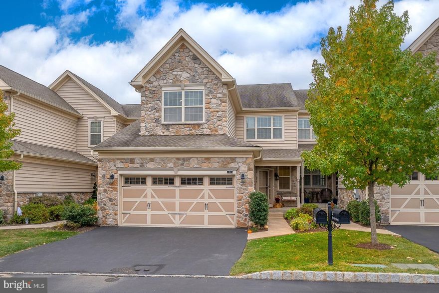 Nestled in the serene community of Applebrook Meadows, this exquisite carriage house-style townhouse offers a harmonious blend of luxury and comfort. Built in 2012, this meticulously maintained residence spans 3,125 square feet, showcasing high-end finishes and thoughtful design throughout. Step inside to discover an inviting open floor plan that seamlessly connects the gourmet kitchen, dining area, and living space. The kitchen is a culinary enthusiast's dream, featuring quartz countertops, a spacious island, and stainless steel appliances, including a built-in microwave, double ovens, and a gas cooktop. The elegant crown moldings and chair railings add a touch of sophistication, while the recessed lighting creates a warm ambiance perfect for entertaining. The main level boasts a cozy living area highlighted by a gas fireplace, ideal for relaxing evenings. Large windows allow natural light to flood the space, enhancing the inviting atmosphere. The formal dining room provides an elegant setting for gatherings, while the breakfast area offers a casual spot to enjoy morning coffee. Retreat to the luxurious primary suite, complete with a walk-in closet and a spa-like bathroom featuring a soaking tub and a stall shower. Three additional bedrooms provide ample space for guests or a home office, complemented by two full bathrooms and a convenient half bath. The fully finished basement offers additional living space, perfect for a media room or play area, while the upper-floor laundry adds practicality to daily living. Outside, the community amenities elevate your lifestyle with access to a sparkling in-ground pool, a well-equipped exercise room, and beautifully maintained common grounds. Enjoy leisurely strolls along the walking paths or host gatherings in the clubhouse and party room. The exterior features a charming blend of stone and vinyl siding, complemented by sidewalks and street lights that enhance the neighborhood's appeal. A private deck invites you to unwind outdoors, overlooking lush garden views. With an attached two-car garage and additional parking options, convenience is at your fingertips. This home is not just a residence; it's a lifestyle choice that embodies luxury, comfort, and community. Experience the best of Applebrook Meadows and make this stunning property your own.