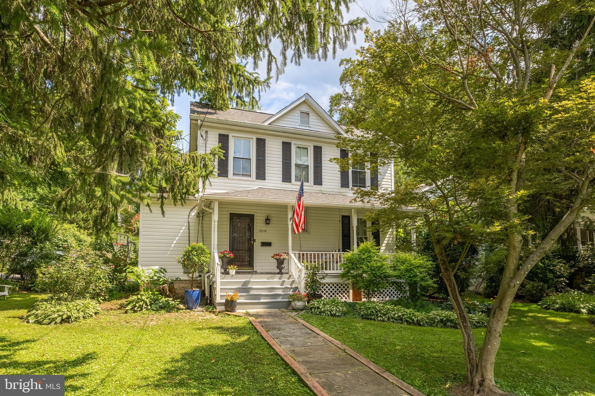 Welcome to this charming turn-of-the-century farmhouse, perfectly situated on a picturesque quarter-acre corner lot in the heart of Kensington. Brimming with character, this home showcases hardwood floors, built-in bookcases, stained-glass accents, and natural light. A gracious staircase anchors the main level, while three bedrooms and one-and-a-half baths provide comfortable living.
Enjoy warm evenings on the inviting front porch or entertain on the spacious rear deck overlooking the expansive, flat backyard—ideal for gardening, play, or relaxation. Additional features include a cozy fireplace, off-street parking, and sought-after Walter Johnson School Cluster zoning. Recent updates include a roof, front door, and front and side windows, all just five years old.
Ideally located just blocks from historic Kensington’s restaurants, shops, and parks, as well as the MARC train, Ride-On bus stop, and major commuter routes—this home offers timeless charm with everyday convenience.
