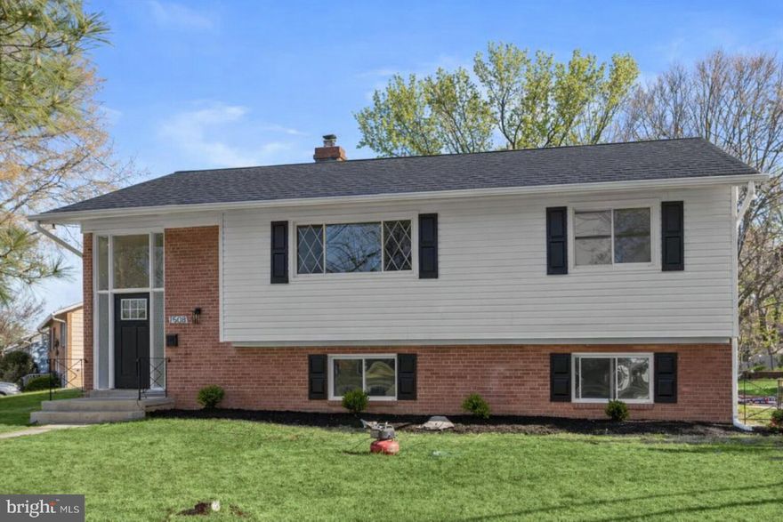 Welcome to your dream home in District Heights! This beautifully renovated 5-bedroom, 3-bath split foyer with a BRAND NEW ROOF welcomes you into a bright, open space with a living room that flows seamlessly into the dining area and gorgeous kitchen. The kitchen is the centerpiece of the home, featuring quartz countertops, a waterfall breakfast bar, premium stainless steel appliances, and custom cabinetry that's perfect for both everyday living and entertaining. Walk down the hall to 3 bedrooms and a full bathroom with modern finishes. The fully finished lower level offers 2 additional bedrooms, 2 full bathrooms, and plenty of flexible space for guests, a home office, or everyday living. Outside, enjoy the convenience of a private driveway and a private backyard. With thoughtful updates throughout, this home is truly move-in ready. Conveniently located with easy access to major commuter routes, shopping, and dining. Schedule your showing today!