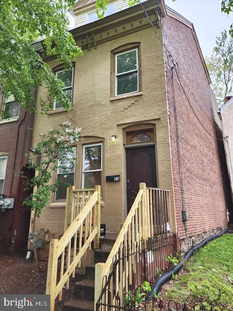 Welcome to 53 Beech Street. This end unit townhome features a kitchen equipped with refrigerator, stove and microwave, living room and powder room all on the main level. The second level features two bedrooms, and one full bath with tub/shower combo. The third level offers two additional bedrooms and another full bath with tub/shower combo. Additional features include an abundance of natural light, luxury vinyl plank flooring, laundry facilities in basement, and outdoor rear yard. Shown by appointment only. Note: First month, last month, and security deposit are due at signing.