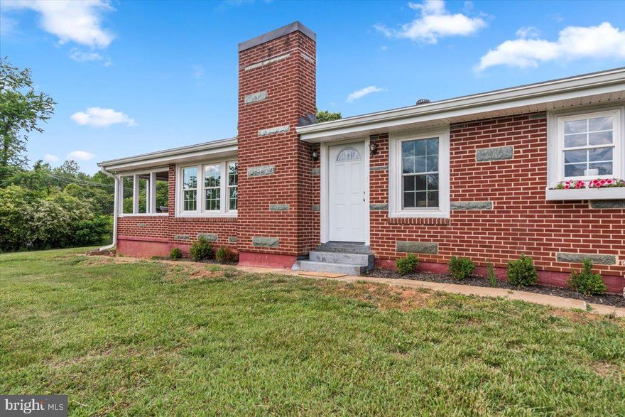 Charming brick ranch on 1.31 acres in Campbell County your picturesque homestead dream, complete with space for gardens, chickens, and a flower box at the kitchen window. One-level living with 3BR, 1BA, carport, and one-car garage. Enjoy an updated kitchen with granite countertops, deep double-bowl sink, and natural light throughout. New windows, updated bath, and main-level laundry add comfort and ease. Cozy up by the gorgeous stone fireplace or relax on the side porch perfect to screen in for peaceful afternoons. Priced to sell and likely best for cash or conventional buyers. See Agent Remarks! Showings to begin Monday 5/12.