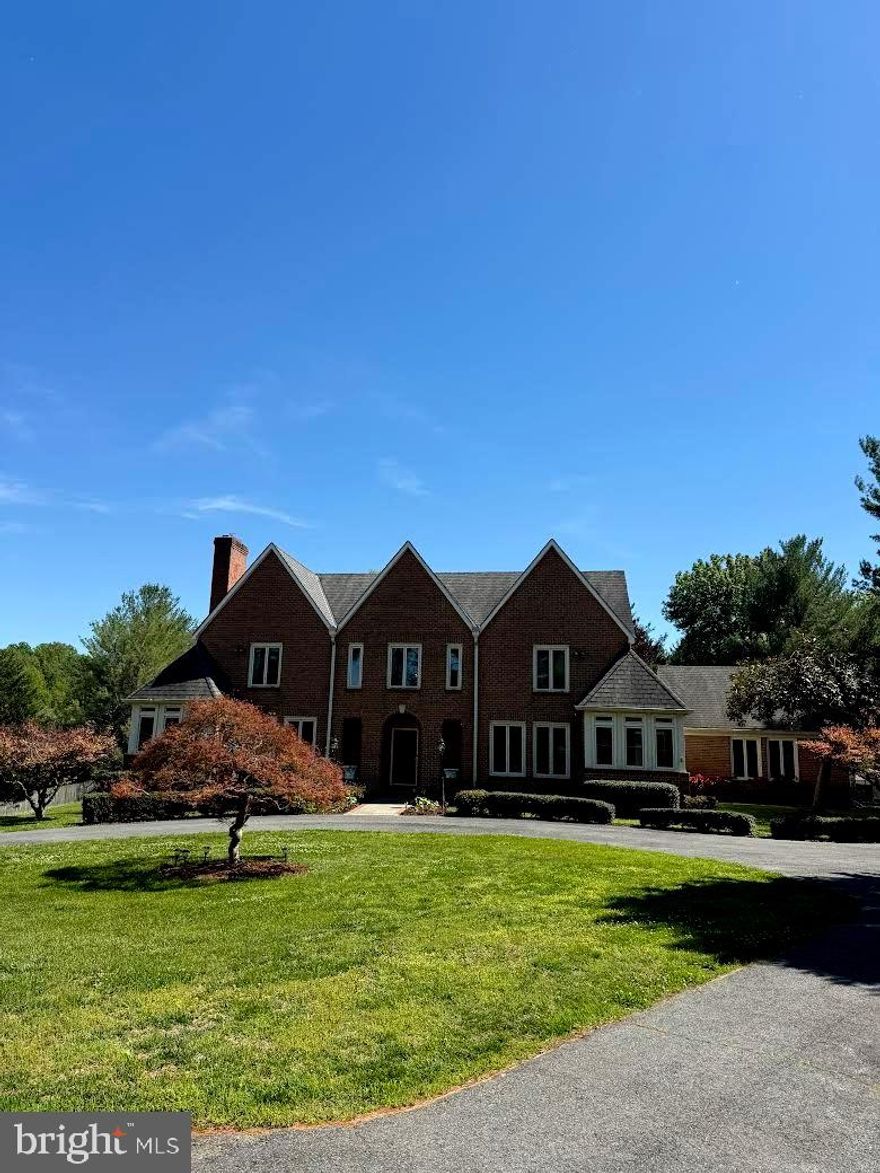 OPEN HOUSE TODAY 12-2 PM 
Experience Luxury, Privacy, and Outdoor Living in Potomac

Nestled on a picturesque two-acre lot within one of Potomac’s most sought-after neighborhoods, this remarkable estate seamlessly combines classic elegance with the modern comforts that discerning buyers desire. Surrounded by lush, mature landscaping, this five-bedroom home offers unparalleled privacy and a perfect blend of sophistication, comfort, and resort-style outdoor living.

Upon arrival, you are greeted by impressive architecture, sweeping grounds, and inviting curb appeal. Step inside to discover spacious, light-filled living spaces crafted for both everyday enjoyment and effortless entertaining. Generous room sizes and a seamless connection between indoor and outdoor areas create an environment that is both welcoming and functional. The primary suite is a true retreat, featuring a luxurious steam shower for ultimate relaxation.

The walk-out basement offers additional living and entertaining space, including a private sauna—perfect for unwinding after a long day—and a separate entrance, providing flexibility for guests or multi-generational living.

The backyard is a sanctuary unto itself. Spend summer afternoons lounging by the spectacular pool, host memorable gatherings on the expansive patio, or simply unwind amidst the tranquil beauty of the surrounding landscape. With 2 acres of usable outdoor space, this property offers exceptional privacy and versatility, while remaining conveniently close to Potomac Village, top-rated schools, parks, shopping, and major commuter routes.

Whether you’re entertaining guests, enjoying quiet evenings by the pool, or making cherished memories with family and friends, 30 Piney Meetinghouse Ct presents a lifestyle that is both elegant and relaxed—set in one of Potomac’s finest locations.