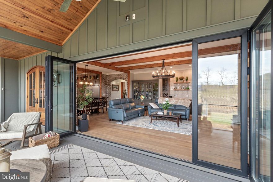 Nestled within the prestigious Gooney Manor Loop area, your find traveling on Gooney Manor Loop, a charming creek and farm stead farms from the past. This exquisite Craftsman-style residence, built in 2024, offers a harmonious blend of luxury and comfort, set against a backdrop of breathtaking panoramic views from front, rear, including all rooms have panoramic views. Spanning over 10.42 acres, this property is a sanctuary of tranquility, featuring a perfect mix of open spaces and lush, partly wooded areas that ensure privacy and seclusion. Step inside to discover an interior that exudes sophistication and warmth. The open floor plan is accentuated by stunning hardwood floors and elegant crown moldings, creating an inviting atmosphere for both relaxation and entertaining. The gourmet kitchen is a chef's dream, equipped with high-end Thermador steel appliances, including a six-burner gas stove, double ovens, and a spacious quartz island that invites culinary creativity. The adjoining dining area, framed by exposed beams, sets the stage for memorable gatherings. Retreat to the luxurious master suite, where a spa-like bathrooms awaits, featuring a walk-in shower and dual flush toilets for an eco-friendly touch. Each of the three bedrooms is thoughtfully designed, with a guest room with a very large walk in closet. The main floor laundry adds convenience to your daily routine, while the wet/dry bar enhances your entertaining experience. The exterior of this home is equally impressive, showcasing meticulously landscaped grounds complemented by paver walkways, covered paver front porch, rear screen porch, both porches having pine ceilings including a second garage 24 x 35 for tractors, cars or workshop. Enjoy evenings on the screened porch or expansive terrace, 
where you can soak in the serene views of the surrounding valley and privacy . For those who appreciate the outdoors, this property is ideally located near a national park, offering endless opportunities for exploration and adventure. This residence is not just a home; it's a lifestyle. Experience the perfect blend of luxury, nature, and modern conveniences in a setting that promises peace and exclusivity. Don't miss the chance to make this extraordinary property your own, where every detail has been crafted for the discerning homeowner. The 10 plus acre paradise is in farm use, to take advantage of tax benefits if desired. The 16 foot open panel door to the screen porch is ideal, not just for parties, but that open to the outdoors feel daily.  The ceilings are 10 ft on the main level, with white oak beam and open shelving from the properties own White Oak Trees. Custom Brick arches, brick wall features, 10' ceilings, crown molding throughout,8'ft solid core doors, solid hardwood flooring throughout, black cased windows, 2 custom oak double doors and ship lap walls will impress you, finally  you have found the most perfect paradise. Wait until you see find the secret pantry/coffee bar! A fenced garden and separate chicken coop are ready for use.