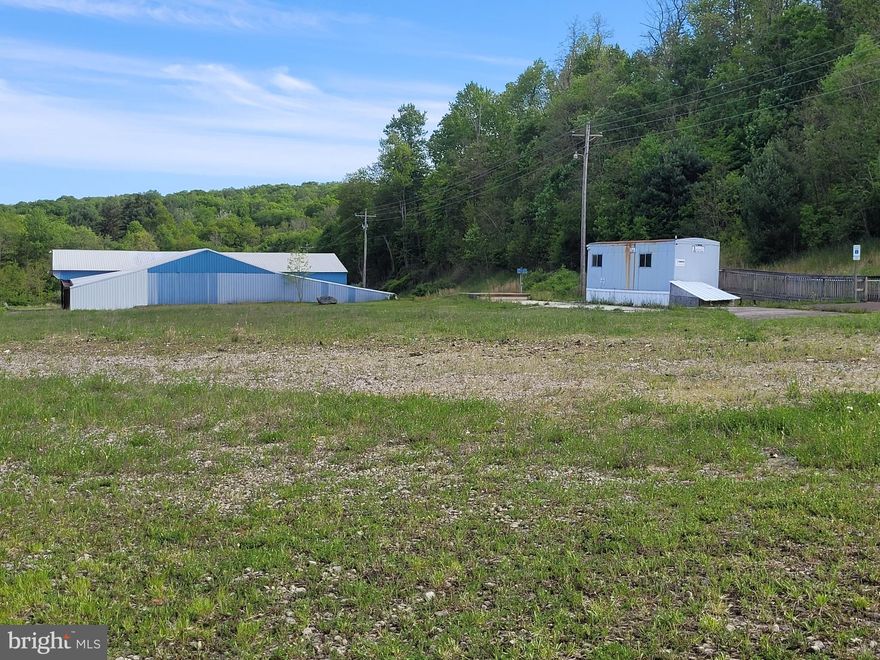 The possibilities that exist! Opportunity awaits with this commercial property. Conveniently located on Berlin Plank Road between Berlin and Somerset, and just a few miles from 219 and Berlin, this property boasts over 10 acres of land, a pole building that could be used for multiple purposes, a trailer that would make a good office (was previously used as a scale house) and plenty of space for parking. A little creativity could go a long way in turning this property into a thriving business. Call to schedule your appointment today! ***Note: Property was previously used as a scrap yard, however, the property use CANNOT be used as a scrap yard by new ownership.***