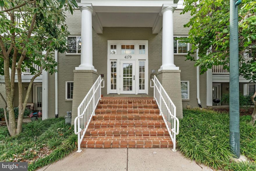 Bright and open 2 bed 2 bath home at The West Village of Shirlington.  Large 1135 sqft updated condo with gorgeous hardwood floors throughout, as well as freshly painted walls.  Open concept kitchen, dining, and family room with recessed lighting.  The kitchen is well equipped with granite counters, stainless steel appliances, and eat-in bar perfect for casual dining.  The generous size sun room with french doors is located off the main living area and makes a fabulous home office.  The floor to ceiling windows flood the main living area with natural light.   Primary bedroom includes en suite and large walk in closet with custom closet system.   Enjoy views of trees and green space from all rooms in the condo.   This unit includes a large storage space (approximately 5'x8') in the basement of the same building.  This amenity-rich community offers an updated club house with gym and huge outdoor pool.  Located just minutes to The Village at Shirlington which offers shops, restaurants, bars, grocery and movie theater.  Conveniently located just off 395 for easy access to DC and other Arlington neighborhoods including National Landing, Pentagon City, Clarendon, Ballston and Rosslyn not to mention Alexandria neighborhoods  Del Ray and Old Town.  ***Storage Space that conveys with unit is 4179-1***