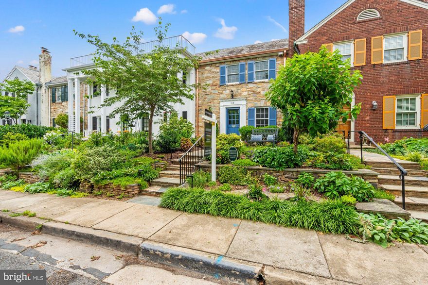 Prepare to fall in love with this stunning, fully renovated, stone-front townhome from the 1940's! Located in Yates Gardens, in the desirable southeast quadrant of Old Town, this beauty boasts a generous layout and size and is one of the LARGEST in the community.

A notable feature is the substantial 1,000 sq ft, two-level rear addition, which includes a great room with built-in cabinets, a fireplace, TV niche, and powder room on the main level. On the second level of this addition is the luxurious master suite with a tray ceiling and en suite bath, including a generously-sized steam shower with multiple shower heads. The upper level technically has 2 bedrooms however there is a large BONUS room which could be used however you choose! 

You will enter by the stone steps and walkway through the elegantly landscaped front yard and enter the house to find an oversized living room with beautiful random-width hardwood flooring and a decorative fireplace. As you walk through the living room, you will be drawn to the dining room and then capture a vast sunken great room that leads to the sun-drenched rear patio.

The renovated kitchen is well-appointed with rich cherry cabinets, stainless steel appliances, matching hardwood flooring, an island with loads of storage space and a trash/recycling drawer, adjacent to the high-ceiling dining room. Continuing two steps down from this level is the large great room with half bath and French doors that open to a rear fenced patio, complete with an optional hot tub.

The upper level offers THREE SIZEABLE ROOMS, including the primary suite as well as a second vintage full bath. 

The basement level features a spacious carpeted recreation room with closets,  a custom built-in entertainment center. You will also find a third full bath, a separate laundry/workshop area, and louvered-door mechanical room. 

Storage is plentiful throughout the home, including a partially floored attic with pull-down access.  Rare in Old Town, the property includes a deeded parking space in the front service road and garbage pick-up directly from the rear alley.

This home is in easy walking distance to the riverfront,  parks, walking paths, several acclaimed restaurants, Balducci’s, and other retail amenities such as a hardware store, bank, and coffee shop, and it offers fantastic entertaining space thanks to its thoughtful addition and prime location in Old Town Alexandria. Best of all, there are NO HOA fees!