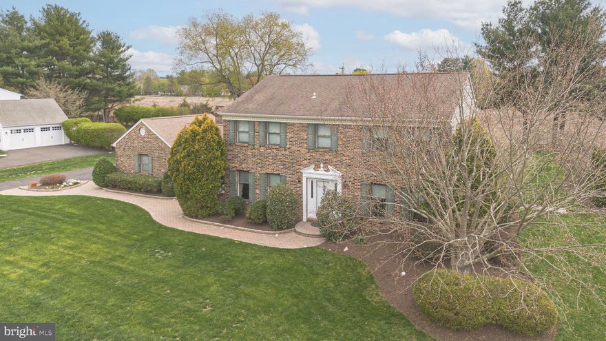 This 4 bedroom home in Washington Crossing exudes  so much pride of ownership! Imagine cozy evenings by the fireplace in the expanded family room, where laughter fills the air and memories are made. This home has been modified  from its original design and now features a vaulted ceiling Family Room with custom paneling, large vaulted ceiling Sun Room with tile floors, Gourmet sized kitchen with custom cabinetry, granite counters, hardwood floors, upgraded stainless steel appliances, custom tile backsplash, walk in pantry and large island with breakfast bar countertop. Study with french doors, formal Dining Rm with hardwood floors, Spacious Bedrooms, Recently updated  Hall Bathroom with granite counters,   custom flooring, tub & shower, Primary Bath features shower and steeping tub. Fenced "flat" back yard with paver patio, outdoor built in grill,  & backing to "preserved" land. Don’t miss your chance to own this remarkable home in the sought-after Council Rock School District—minutes from I 295. Schedule your private tour today!