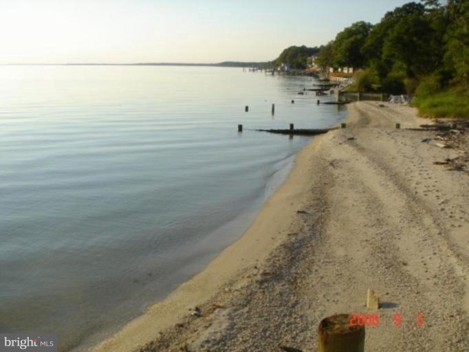 Lovely remodeled rambler located in a quaint waterfront community. Featuring three bedrooms plus an extra room for an office or den, two full baths, new back deck, 2 car garage and lots of storage. All this plus a nice view of the Patuxent River with spectacular sunsets. Pets considered case by case