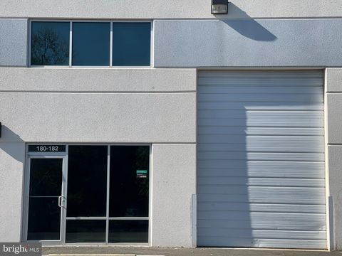 Photo of 21760 Beaumeade Circle #180, ASHBURN, VA 20147 (MLS # VALO2120022)