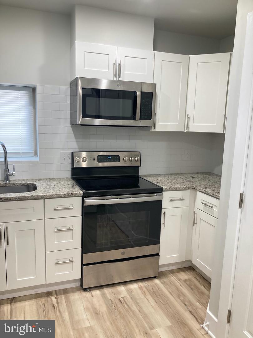 Welcome Home to this beautiful 2 bed/1 .5 bath bi level unit with private outdoor space. Modern and clean design throughout, recessed lighting, hardwood flooring, stainless steel appliances, central air & heat, video intercom for secure access, great natural light and ready for a 6.1.25 move in. About The Neighborhood: You'll be walking distance from the Huntingdon Station for the MFL, Temple University Hospital, and convenient shops and eateries along Lehigh Ave, such as One Pound Cheesesteak, Calypso Bar, Noodle House, Fiore Pizza, Franny Lou's Porch, and much more! Lease Terms: Generally, first month, last month, and one month security deposit due at, or prior to, lease signing. Other terms may be required by Landlord. Pets are conditional on owner's approval and may require an additional pet fee, if accepted. (Generally $500/dog and $250/cat). Tenants responsible for all utilities: electricity, cable/internet, $65/mo flat water fee.