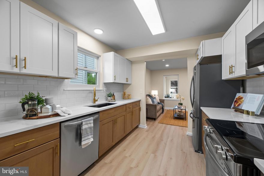 This fully renovated 3-bedroom, 2.5-bath home offers a thoughtful blend of modern updates and comfortable living in a gated community. 

The main level features a completely updated kitchen with shaker-style cabinetry, quartz countertops, a tiled backsplash, and all new appliances. New flooring and fixtures run throughout the home, creating a cohesive and finished feel. 

A bright four-seasons room with its own mini-split provides flexible, year-round living space. Upstairs, the primary bedroom opens to a spacious private deck, offering a quiet outdoor retreat.

All bathrooms have been fully renovated, and major systems including HVAC, plumbing, and water heater are new, offering peace of mind beyond the cosmetic improvements.

Additional upgrades include new interior and exterior doors and numerous finishing details throughout.

Located in a water-oriented community with convenient access to local marinas, dining, and commuter routes, this move-in ready home offers quality and comfort in a sought-after setting.