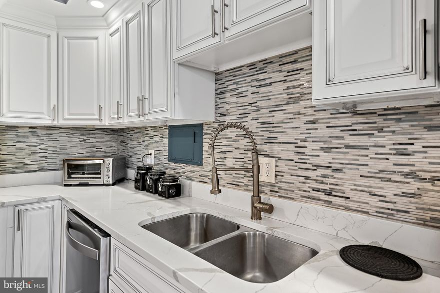 Excellent investment opportunity with a ready to move in, fully renovated  condo with top of the line kitchen cabinets and crown moldings,  upgraded modern countertops, engineered wood flooring in the living, dinning and all the rooms.   Renovated bathrooms  with ceramic tile and high quality tiles and cabinets. Condo is conveniently located close to PG Plaza and Shopping centers.  It is conveniently located near University of Maryland College Park,  Silver Spring and easy access to the highway.   Please park at the visitors parking  to avoid towing.   To find the visitors parking , make a left and right towards the side of the building close to the swimming pool.  Key in the MASTERKEY lockbox in the Condominium apartment 1101. When you enter the lobby turn right and take the elevator to the 11th floor, make a left to 1101.   You can either go thru the back door with the entrance key pad or go thru the front door then go to  the 11th floor.