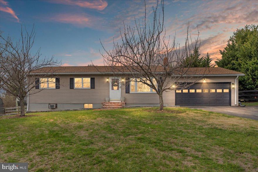 Welcome to 32 Cheerful Faye Dr in Inwood, WV — a warm and inviting 3-bedroom, 2-bath ranch home offering comfortable one-level living with thoughtful updates throughout. Situated on 0.51 acres with no HOA, this property combines modern improvements, flexible living space, and an impressive 3-garage setup
 
The updated kitchen offers concrete countertops, a farmhouse sink, propane range, updated flooring, and a built-in buffet with additional storage — perfectly positioned for a dining nook for family and friends to enjoy. The main level includes three bedrooms and a beautifully renovated bathroom featuring hand-cut tile and a full gut remodel. A convenient laundry chute adds everyday functionality, sending laundry directly to the basement.

The finished lower level provides additional living space with modern LVP flooring, recessed dimmable lighting, and a fully built-out bathroom with a stand-up shower. A nook under the stairs creates a great space for a play area, pet retreat, or additional storage. The unfinished portion of the basement includes a laundry area, workspace, and a drive-under garage.
This property stands out with an impressive 3-garage setup, including a 2-car attached garage and an additional driveway to drive under the house into the basement garage with workshop space — ideal for hobbies, storage, or projects. Two separate driveways add convenience and flexibility.

Outside, enjoy the fully fenced backyard with a patio and awning, built-to-last swing set, and a shed on a concrete pad. The front yard features fresh landscaping, a walkway, and a welcoming brick-covered porch.

Major improvements include a roof replaced in 2018. HVAC in 2020. 

Conveniently located near local amenities, schools, commuter routes, and everyday essentials, this home offers comfort, value, and opportunity.