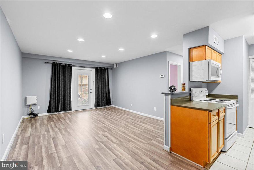 Welcome to your new home! This beautifully appointed one-bedroom condo perfectly blends modern comfort and cozy charm. Located in a desirable Cardinal Forest neighborhood. This home features an open-concept living space with ample natural light.  As you enter, you’re greeted by a spacious living area that seamlessly connects to a well-designed kitchen with plenty of cabinetry for storage. The adjacent dining space is perfect for family meals and entertaining guests.  The new windows and the patio door were installed in 2024.  Additional highlights include in-unit laundry, assigned parking, and access to multiple walking trails. This condo offers the perfect urban lifestyle, conveniently located near shopping, dining places, and public transportation.  Don’t miss the opportunity to make this charming space your own!