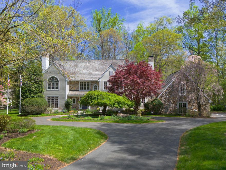 Nestled at the end of a quiet cul-de-sac in Leopard Farms, this beautiful, spacious home with a stunning outdoor oasis offers the perfect blend of privacy, community, and convenience.

Custom-built by Hank Belber and designed by Ann Capron, the home sits on 1.7 beautifully landscaped acres with mature plantings, a flagstone terrace, multiple seating areas, and a pool with pool house—all creating an inviting outdoor retreat. A circular driveway leads to the stone and HardiePlank exterior, capped by a classic cedar shake roof.

Inside, the two-story marble foyer with turned staircase and oversized windows sets a welcoming tone. The first floor includes a home office with hardwood flooring, a formal living room with marble-surround fireplace, and a dining room with decorative moldings, bay window, and French doors that open to the backyard. The heart of the home is a fully renovated gourmet kitchen featuring white cabinetry, a center island with counter seating, tile backsplash, and stainless steel appliances, including a warming drawer. A walk-in pantry and adjacent butler’s pantry—with sink, under-counter beverage fridge, and custom cabinetry—make entertaining seamless.

The kitchen opens into a breakfast area and a vaulted-ceiling family room with fireplace, brick surround, and custom built-ins—creating an ideal space for everyday gathering. A large mudroom connects the three-car garage and fenced backyard, while a laundry room and rear staircase adds convenience.

Upstairs, the second-floor landing includes a built-in bookcase leading to a generous primary suite with vaulted ceiling, Palladian window, sitting area, dual walk-in closets, and a spa-like bath with double sinks and frameless glass shower. Four additional bedrooms, two full baths provide comfort and flexibility for family and guests.

The finished lower level offers space for media, play, hobbies, and storage. Outdoors, enjoy summer evenings, poolside dining under the stars, or peaceful walks through the wooded perimeter.

Located less than five minutes from the Daylesford train station, Upper Main Line YMCA, and shopping and dining in Berwyn, Paoli, Devon, Wayne, and Newtown Square—this home offers a rare Main Line lifestyle that truly has it all