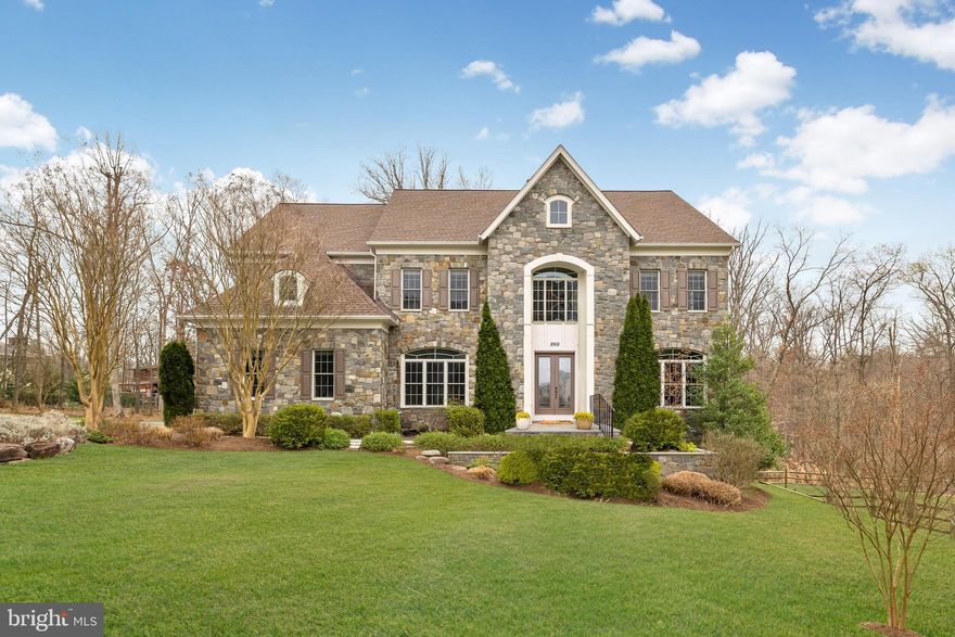 ***OPEN HOUSE CANCELLED*** Located minutes from Cabin John Village, 270, and 495, this impeccably maintained residence nestled within a cul-de-sac, offers a rare blend of luxury, privacy, and convenience. Crafted in 2009 by Beacon Crest Homes, no detail has been overlooked in this stunning 8,800+ sq ft home.

Upon entry through glass double doors, you're greeted by a grand foyer adorned with gleaming hardwood floors and intricate trim work. The eye is immediately drawn to the elegant spiral staircase, leading the way to an expansive main level featuring 10 ft ceilings, a formal dining room, a sun- drenched living room, a library with built-in shelves, and a kitchen that epitomizes sophistication. 

The gourmet kitchen boasts luxurious oak cabinets, top-of-the-line VIKING appliances, an oversized central island, granite countertops, and connected to a butler's pantry. The family room exudes warmth and elegance with its arched windows and stone fireplace. The sunroom was designed to evoke the charm of an enclosed porch, but still have the  luxury of ceramic tiles and central ventilation. Step outside the sunroom and you’ll find yourself on the private and spacious deck perfect for summer gatherings and al fresco dining, looking over the patio downstairs and back into the conservation forest. 

Ascending to the second floor, the master suite awaits boasting a sitting area, wet bar, fireplace, and separate walk-in closets. Indulge in the luxurious spa-like master bath, featuring a floor-to- ceiling tiled steam sauna/shower, jacuzzi, separate travertine sinks, separate private toilets, and a dazzling Swarovski crystal flush chandelier.

Completing the second floor are three generously sized bedrooms, each with plush new carpeting, en-suite bathrooms with granite countertops, and walk-in closets all with built in shelves. For added convenience, the laundry room is thoughtfully located on this level, complete with a linen closet.
Ascend to the third floor to discover an additional bedroom that could be used as an au pair suite, playroom with skylight, (both with walk-in closets) and a full bathroom.

Last but not least, the expansive fully finished walk-out basement offers additional living  and entertainment space, with hardwood floors throughout, a bar complete with a wine fridge, a full bathroom, and multiple rooms that can be utilized as bedrooms, offices, or exercise areas. Walk outside to the patio area where you can watch the stars around a fire pit. To the right of the house you’ll find a basin instead of a neighbor, allowing additional privacy. 

Special highlights of this exceptional home include a recently replaced roof (2019), a 75-gallon water heater (replaced in 2022), brand new carpeting and paint (2024), integrated ceiling speakers, 3 car garage with epoxy finished floors, and an expanded driveway for ample parking.