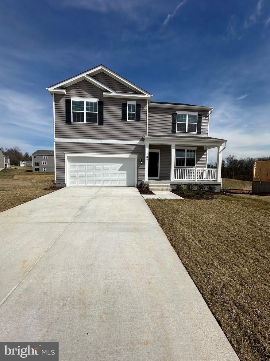 Immediate Move In ! Backs to open space on a gourgeous walk out homesite! Complete with main level bedroom, and finished basement rec room! One of the best lots in the neighborhood his property sits on a spacious and very usable walkout homesite that backs to trees. This 2 Story single family home marries features and affordability and comes with everything included.  5 Bedrooms, LVP floors in the main living spaces, included kitchen appliances, granite countertops and white cabinets give the updated look you've always wanted. Located next to Morgan's Grove Park and just down the street from Downtown Shepherdstown!