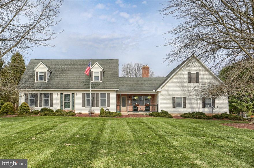 Beautiful 4-bedroom, 2.5-bath Cape Cod–style home offering 2,893 sq. ft. of living space on 2.08 peaceful country acres—with garage parking for 6+ vehicles plus space for an RV or boat! The main level features a remodeled kitchen with island and bar seating, Corian countertops and all appliances included (refrigerator, dishwasher and built-in microwave). A pellet stove provides an efficient supplemental heat source, capable of heating much of the home, in addition to the existing heat pump. The layout includes a half bath, a formal dining room, living room and a versatile family room that doubles as a four-season room with access to the private deck. Tucked down the hallway, the primary suite offers two closets plus a spacious laundry room with wall-to-wall closet storage, washer and dryer included, providing excellent storage and functionality. The remodeled en-suite bath features a soaking tub, walk-in shower and a vanity with generous space and a neutral palette. Upstairs, you’ll find three additional bedrooms, each with ceiling fans and carpeting, along with a full bathroom. The lower level offers flexible space currently used as a gym, play area and for storage, and includes a second washer and dryer, half bath and walk-out access to the garage. Enjoy the benefits of well water and a septic system, with no public utility bills, and get ready to relax on the front porch overlooking farmland—perfect for taking in evening sunsets. The backyard provides plenty of room for outdoor enjoyment—whether for pets, play or simply soaking in the peace and privacy that this kind of acreage allows. Last but not least, this is an incredible opportunity for car collectors, hobbyists or anyone simply needing space—bring the cars, the toys, and the tools (and maybe a few things you don’t even have yet). This property offers exceptional flexibility for storage and hobbies, featuring an attached 3-car garage, detached 3-car garage, a shed, a carport, a place for a trailer to be parked and a spacious pole building for an RV, boat or additional vehicles.