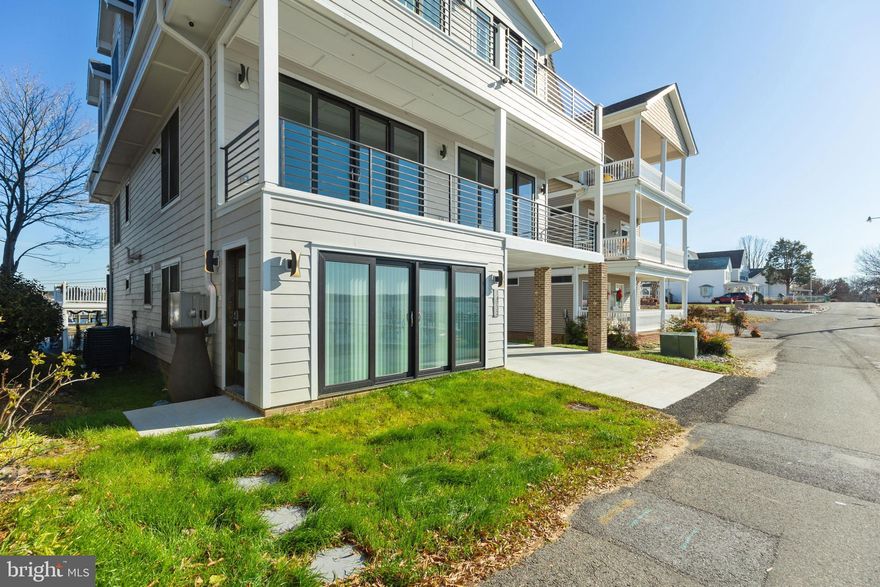 LUXURY MODERN WATERFRONT RENTAL apartment with big Patuxent River views and a private parking spot in the heart of Solomons Island is available now! Gorgeous, brand new 2BR/2.5BA apartment is thoughtfully designed with full gourmet kitchen, modern tiled floors throughout, closets with built-in organizers, private full-sized laundry area, en suite baths for each bedroom and half bath for guests. Private entrance. Available for long-term leases only. Maintain this as your ongoing pied- a-terre for breaks from the city life, or while your boat lives at a marina and you want a land location. Landlords pay for water and sewer, wifi, natural gas. Tenant pays electric (sep meter). Call for details.