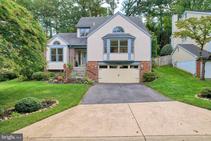 Welcome to this beautifully updated colonial-contemporary in the highly sought-after Woodside Forest neighborhood of Silver Spring. Nestled on a quiet street with tree-lined median, and just steps from tranquil Sligo Creek Park, this home offers the perfect blend of peaceful surroundings and unbeatable convenience. Enjoy easy access to the Capital Beltway, Forest Glen and Silver Spring Metros, walking/biking trails, downtown Silver Spring, and Washington D.C.—all within minutes.
 
Inside, you’ll love the freshly painted interior, refinished hardwood floors, an open, sun-filled layout, and thoughtful updates throughout. The front living room welcomes you with versatility and warmth.  A spacious formal dining room flows directly to the remodeled kitchen, where granite countertops, crisp white cabinetry, stainless steel appliances, and a large peninsula create a stylish and functional hub. A well-appointed eat-in breakfast area—with space for a full table and chairs, an adjacent pantry, and primary-level laundry—rounds out the space, providing a natural, open transition into the family room.
 
Anchored by a cozy wood-burning fireplace, the family room opens to the backyard through a sliding glass door. Step outside to your private, fenced yard that offers a flagstone patio, lush gardens, and custom stonework—ideal for entertaining or simply unwinding on a quiet evening.
 
The main-level primary suite is a true haven, featuring two walk-in closets and a spa-like bath with an over-sized Jacuzzi soaking tub, expanded walk-in shower, dual vanity and custom mirrors. A renovated powder room completes the main level.

Upstairs, you’ll find three spacious bedrooms with abundant closet space plus an updated, full Hollywood-style bath and linen closet.

The finished lower level expands your living space, featuring a large rec room, guest bedroom and updated full bath, ample storage, and a roomy two-car garage.

This home truly has it all: style, comfort, and location—move in and enjoy your new home in the welcoming Woodside Forest.