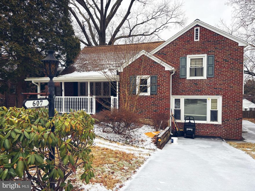 Step into this well maintained classic Whitman home at 607 N. 26th Street!  You will love the spacious foyer with a conveniently situated powder room.  The expansive living room showcases a gas fireplace while the dining room and kitchen combine to create a seamless space.  Enjoy the charming four seasons sunroom and the deck which is perfect for entertaining during warmer months. The lower level features a spacious family room and laundry room/utility area. The second floor has three bedrooms and a full bathroom, with the fourth bedroom, accompanied by a powder room, situated on the third floor. Additional highlights include generous built-ins, a walk-through closet, and walk-up attic space. A partial basement offers supplementary storage. Enjoy a short stroll to the athletic field situated close by to enjoy a game of baseball or a  jog around the track. This impressive Whitman split home is being sold as is and is expected to attract interest quickly. Don't hesitate to schedule a showing!