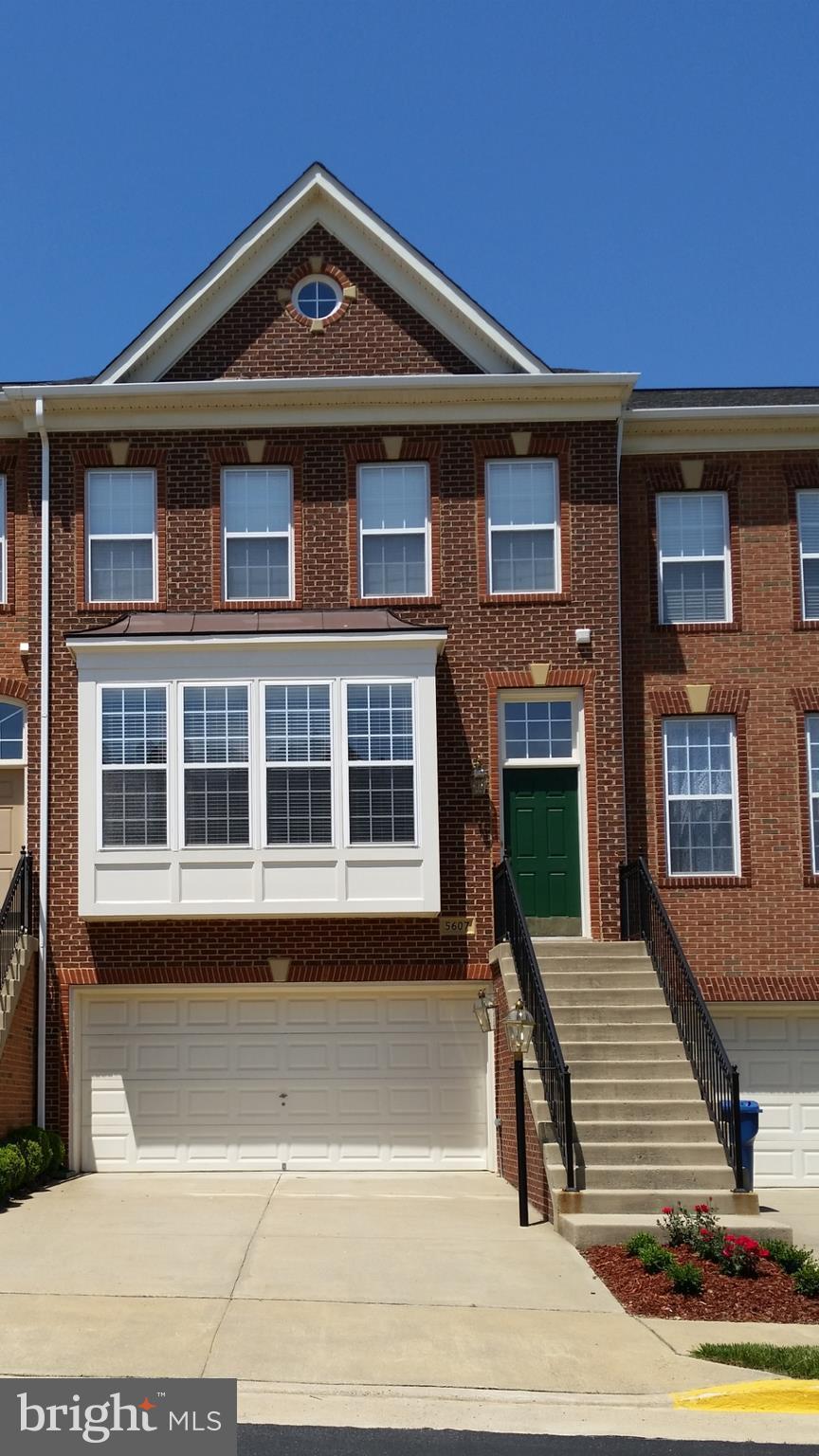 BEAUTIFUL BRICK FRONT 2 CAR GAR TOWN HOME** 3BED, 3.5 BATH, OPEN FL PLAN, HW FLOORS, CROWN MOLDING, SS APPLIANCES, KIT ISLAND, 42" MAPLE CABINETS, COZY GAS FP, DECK, OPENS TO COMMON AREA, FENCED REAR YARD, PATIO, WALK OUT BASEMENT.. TOO MUCH TO LIST..**NO SMOKIN OR PETS**