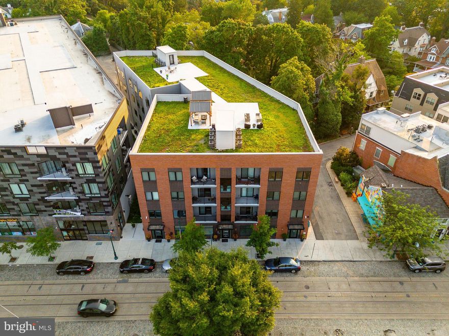 Pelham Place Apartments: This exceptionally-designed, 51,835 SF multifamily investment property is a turnkey blue-chip apartment building located in a coveted submarket in Northwest Philadelphia (NWPHL) — Mount Airy. Anchored by two (2) essential businesses on the ground floor, 36 apartments rise 4 storeys up to a landscaped green roof with panoramic vistas of Mount Airy and the surrounding lush landscape of NWPHL. The unit matrix includes two (2) commercial units, four (4) 1bd, twenty-seven (27) 2bd, and five (5) 3bd apartments. Average size for the apartment units is a generous 914 SF — well in excess of market averages. $1770/unit is the average rental price. The oversized apartment homes feature modern fit + finish kits including high ceilings, window treatments, stone countertops, carpeted bedrooms with spacious closets, sleek LVP flooring in kitchens and living areas, custom shaker cabinetry and contemporary bath suites. Keyless entry and digital high-tech security intercoms provide a seamless building access experience. A fully-equipped business lounge and entertainment center are located on the ground floor, providing 24-hr access and enjoyment for residents immediately upon entering the building — similar to the look and feel of a luxury boutique hotel — complete with with MAC desktop stations, a full-sized wet bar, deluxe furnishings, televisions, fireplace, coffered ceilings, wallpapered surrounds and local artwork. A fully-equipped fitness center is located in the lower level as well. Located on the historic cobbles of Germantown Avenue with amenities in abundance (all within walking distance), Pelham Place Apartments represents one of the finest acquisition opportunities in the Greater Philadelphia MSA to purchase a "like new" construction stabilized asset in an “in-demand” Philly neighborhood at a value well below replacement cost. 10 year tax abatement. Buyer responsible for verifying taxes, SF, financials in DD.