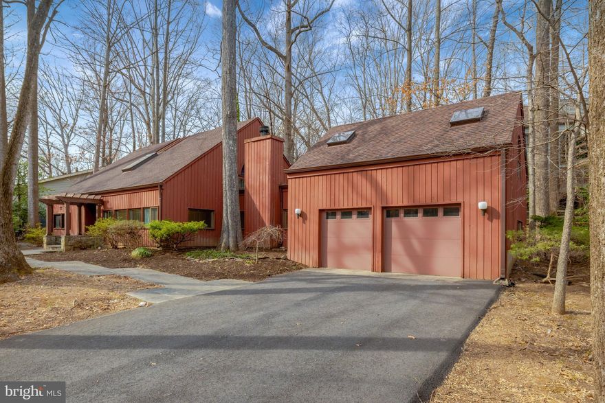 LIMITED TIME OFFER - Seller offering up to $10,000 credit toward closing costs! Welcome to 1941 Upper Lake Drive! Nestled among a beautiful and diverse canopy of trees, this unique contemporary home offers a peaceful retreat just moments from a serene walk along Lake Thoreau. Enjoy the best of both worlds—natural tranquility and easy access to shopping, schools, and Metro.

Inside, soaring ceilings, exposed wood beams, and expansive windows create a light-filled space that brings the outdoors in. This home blends modern charm with the warmth of nature, offering a truly distinctive Reston lifestyle.

The open-concept main level features a cozy living room with a beautifully updated stone and marble fireplace, rich wood floors, and a kitchen with recently updated appliances and ample cabinetry. The dining area leads to a private backyard with a patio—perfect for outdoor gatherings. Recently renovated bathrooms throughout the house!

The spacious primary suite includes a loft area, ideal for a home office or reading nook. Additional highlights include a large bonus room above the garage with built-in storage, modernized bathrooms, and a two-car garage.

This home has been thoughtfully updated with modern conveniences and high-quality improvements. Recent upgrades include: new engineered hardwood flooring, a fully renovated master bathroom with a tiled shower, a re-faced stone fireplace in the living room, and brand-new baseboards throughout the first floor. The half bath and full bathroom have been completely renovated with new drywall, lighting, vanities, and fixtures. The driveway was replaced and widened, and premium Pella sliding doors with embedded shades were installed. The home also features a newer HVAC system with a whole-house humidifier, replaced roof and gutters, and custom blinds.

Located in a premier Reston neighborhood with access to Reston’s renowned amenities, including pools, lakes, trails, and more. Don’t miss this opportunity to own a contemporary gem in a sought-after community!